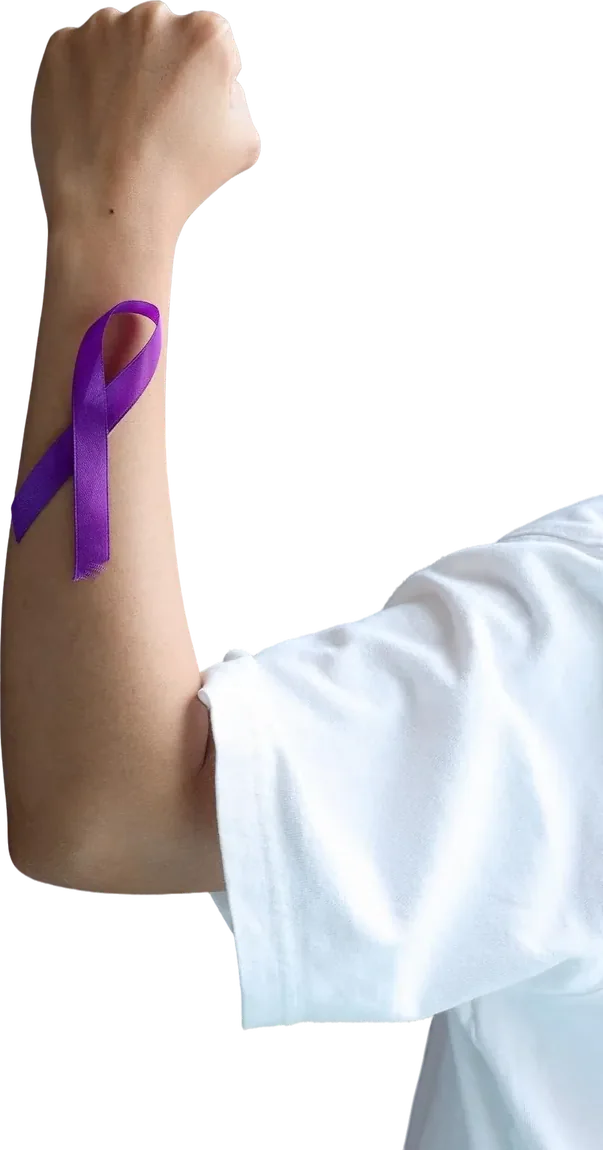A raised fist with a purple pancreatic cancer awareness ribbon on the forearm
